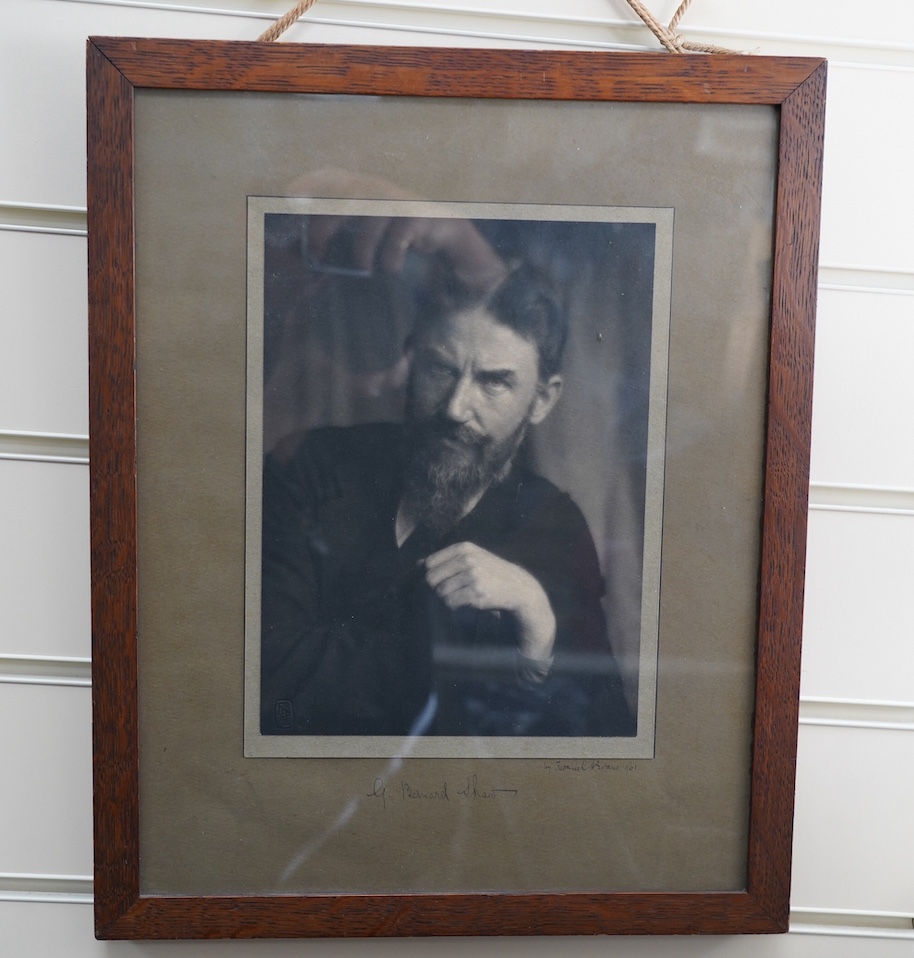 A signed photograph of George Bernard Shaw, also signed by the photographer Frederick H. Evans and dated 1901, in a contemporary oak frame 39 x 31cm, both signatures on the mount. Condition - good